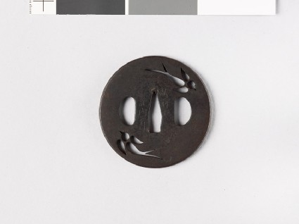 Round tsuba with two flying swallowsfront