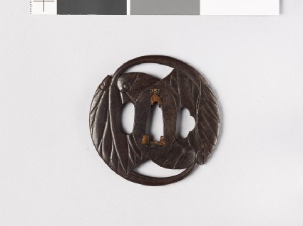 Round tsuba in the form of two aoi, or hollyhock leavesfront
