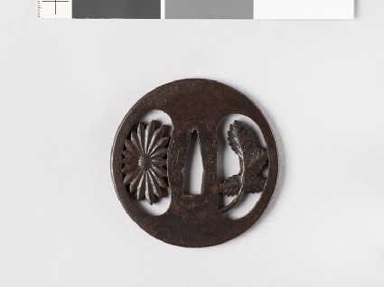 Round tsuba with chrysanthemum flower and leaffront