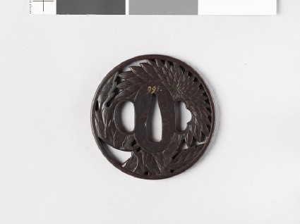 Round tsuba with chrysanthemum flower and leavesfront