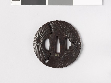 Round tsuba with three stylized chrysanthemumsfront