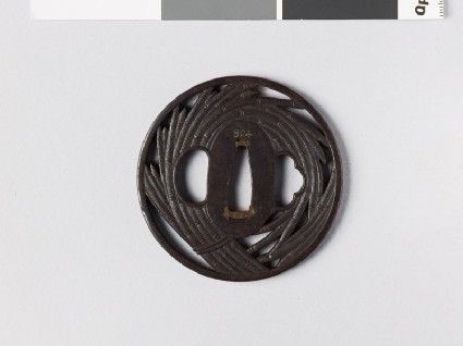 Round tsuba with horsetail stemsfront