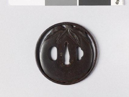 Round tsuba with egg-fruitfront