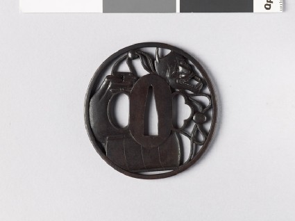 Tsuba with inrō, pouch, Hannya mask netsuke, and ojimefront