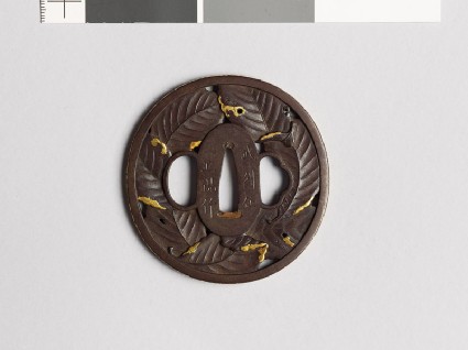 Tsuba with overlapping chestnut leavesfront
