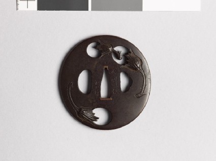 Lenticular tsuba with egg fruitsfront