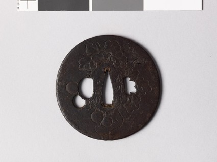 Tsuba with vine leaves and grapesfront