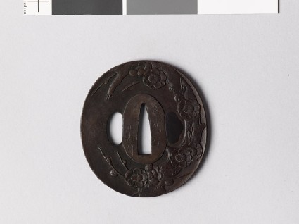 Tsuba with flowering plum treefront