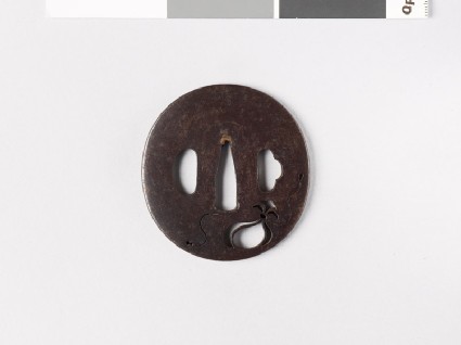 Lenticular tsuba with money bagfront