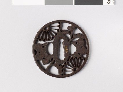 Round tsuba with chrysanthemum flowers and leavesfront