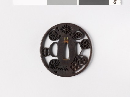 Tsuba with mon of nine daimyō familiesfront