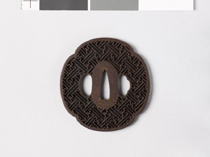 Mokkō-shaped tsuba with rinzu, or swastika-fret diaperfront