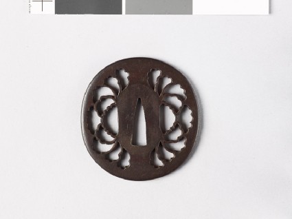 Lenticular tsuba with peony flowerfront