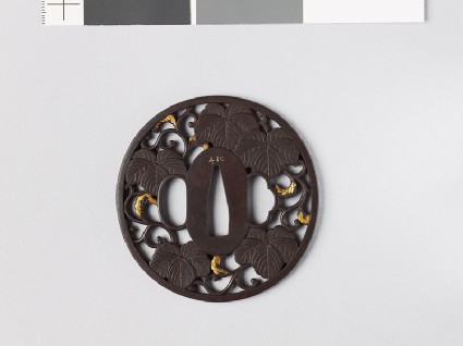 Tsuba with Cissus leaves and karakusa, or scrolling plant patternfront