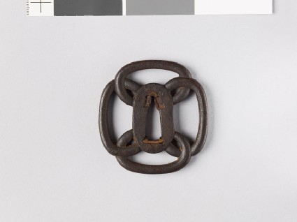 Mokkō-shaped tsuba formed from four loopsfront