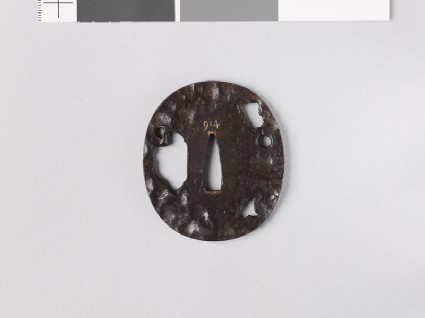 Tsuba with six holes of different sizesfront