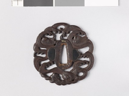 Tsuba with mandarin ducks and wavesfront