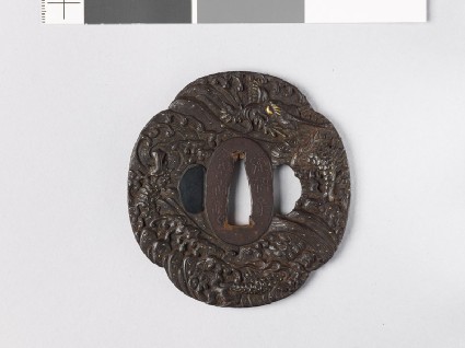 Mokkō-shaped tsuba with a dragon emerging from wavesfront