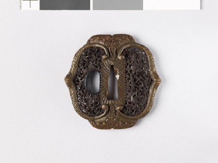 Mokkō-shaped tsuba with demon mask and dolphinsfront