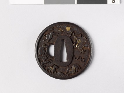 Round tsuba with animals of the Chinese zodiac amid rocksfront