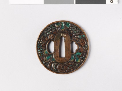 Tsuba with squirrel amid vinesfront