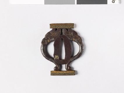 Tsuba in the form of a tripod standfront