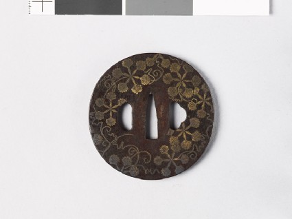 Round tsuba with heraldic leavesfront