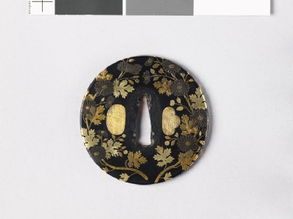 Tsuba with chrysanthemumsfront