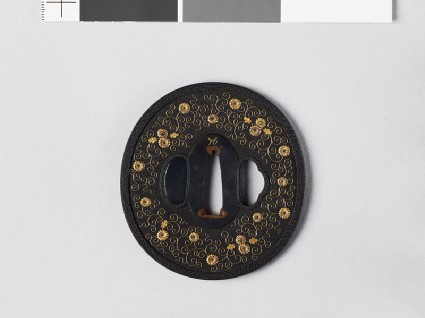 Tsuba with heraldic chrysanthemums and leavesfront