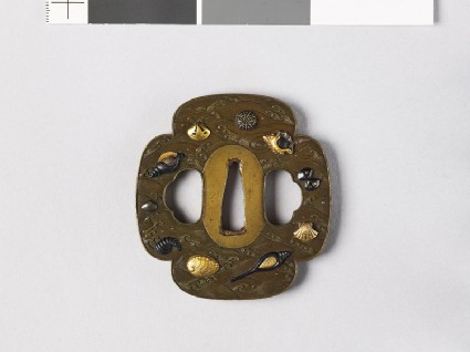 Mokkō-shaped tsuba with sea shells amid wavesfront