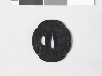 Mokkō-shaped tsuba with punched decorationfront