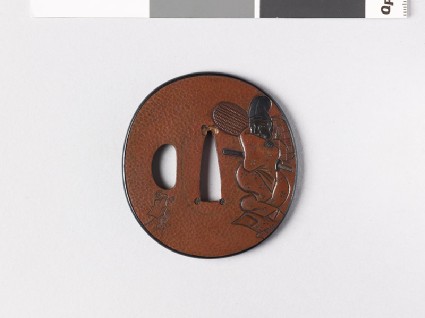 Tsuba depicting a travelling showman and his monkeyfront