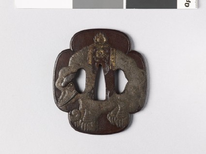 Mokkō-shaped tsuba with an elephant, chrysanthemum, and tama, or sacred jewelsfront
