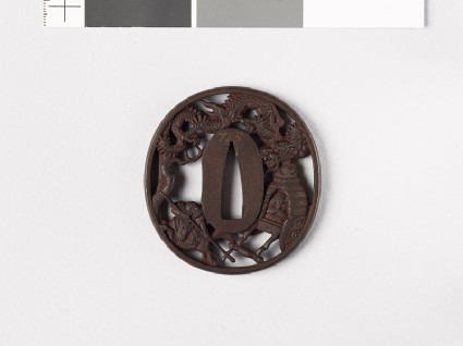 Tsuba depicting a Chinese emperor, his attacker, and a dragonfront
