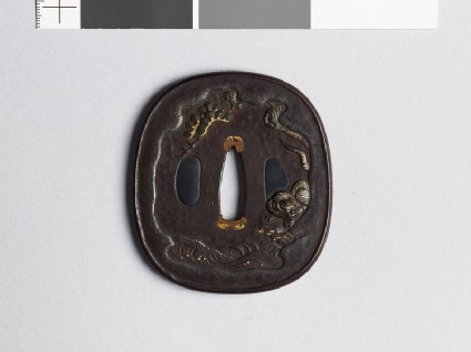 Tsuba with tiger in a landscapefront