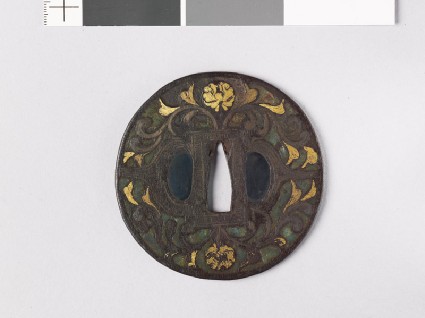 Round tsuba with flowers, foliage, and dragonsfront