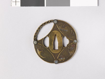 Round tsuba in the form of a shippō diaper, with Luck Objectsfront