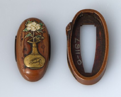 Fuchi and kashira with lotus pod and peonyfront