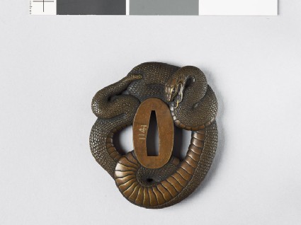 Tsuba in the form of a coiled snakefront