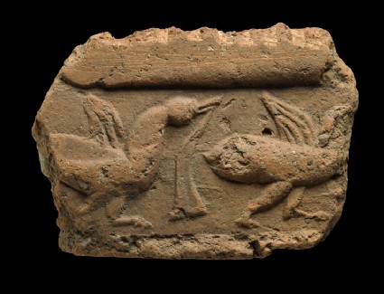 Fragment of a tile with ducksfront