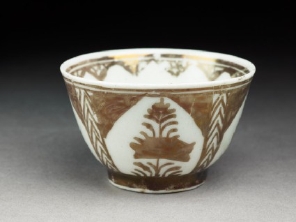 Cup with lustre decorationoblique