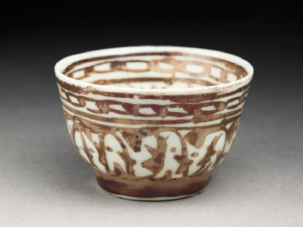 Cup with lustre decorationoblique