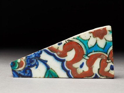 Tile fragment with floral decorationtop