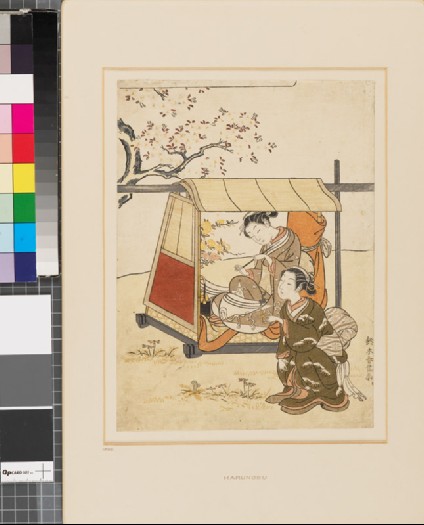 Woman resting under a cherry tree with her maidfront