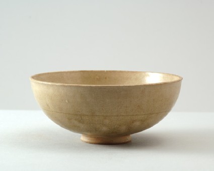 Greenware bowl with flowerfront