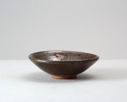 Black ware bowl with 'oil spot' glazesfront
