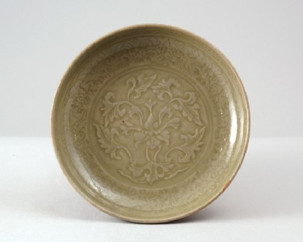 Greenware dish with floral decorationfront