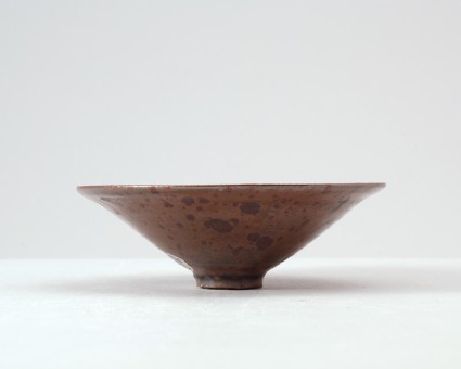 Ding type black ware bowl with russet iron glazesfront