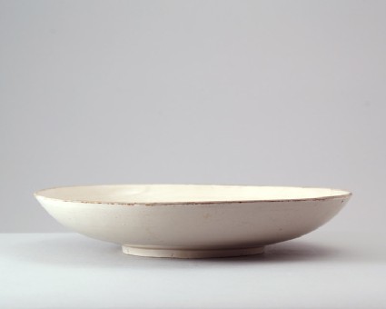 White ware dish with floral decorationfront
