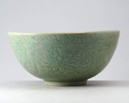 Greenware bowl with lotus flowers and wavesfront